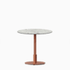 Round dining table with compact‑laminate top and metal pedestal base.