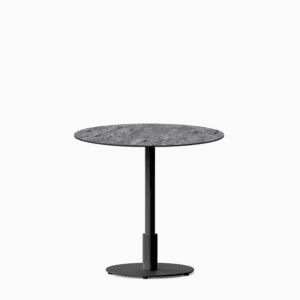 Round dining table with compact‑laminate top and metal pedestal base.
