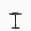 Round dining table with marble top and metal pedestal base.