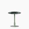 Round dining table with marble top and metal pedestal base.