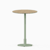 Round bar table with compact‑laminate top and metal pedestal base.