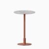 Round bar table with marble top and metal pedestal base.