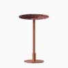 Round bar table with marble top and metal pedestal base.