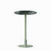 Round bar table with marble top and metal pedestal base.