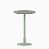 Round bar table with terrazzo top and metal pedestal base.