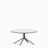 Round dining table with compact‑laminate top and aluminium base