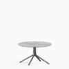 Round dining table with marble top and aluminium base.