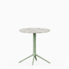 Round table with terrazzo top and cast aluminium base.