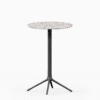 Round table with terrazzo top and cast aluminium base.