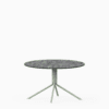 Round compact‑laminate coffee table with aluminium base.
