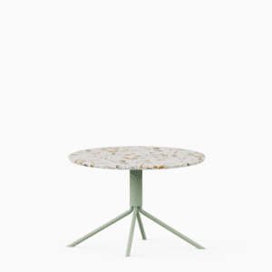 Round terrazzo table with speckled stone top and green aluminium base.