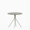 Round compact‑laminate dining table with aluminium base.