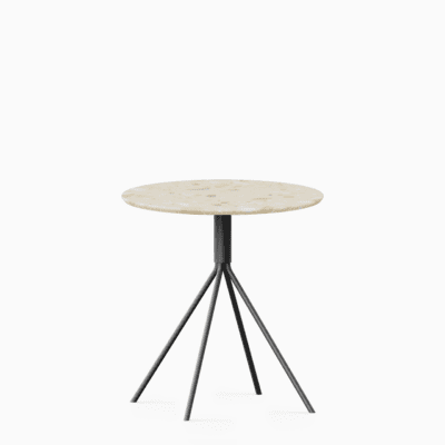 Round terrazzo table with speckled stone top and powdercoated aluminium base.