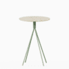 Round terrazzo bar table with speckled stone top and powdercoated aluminium base.