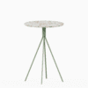 Round terrazzo bar table with speckled stone top and powdercoated aluminium base.