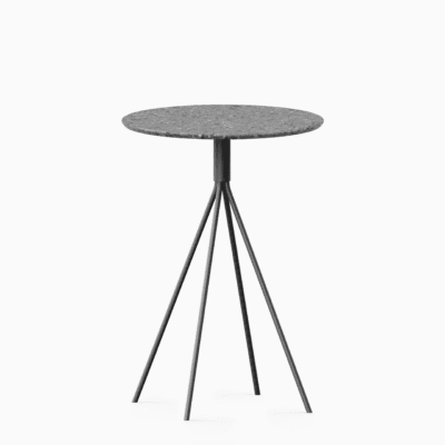 Round terrazzo bar table with speckled stone top and powdercoated aluminium base.